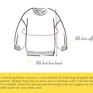 Puede incluir: Un dibujo en blanco y negro de un su&eacute;ter de cuello redondo con mangas largas, un dobladillo de punto de canal&eacute; y pu&ntilde;os de punto de canal&eacute;. El su&eacute;ter est&aacute; dise&ntilde;ado para un ajuste relajado.