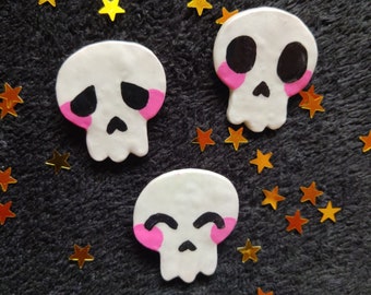 Glow in the dark skull clay pins