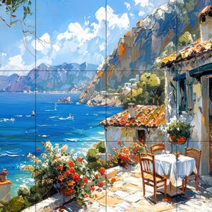 May include: An impressionistic painting of a coastal scene. A white building with a red-tiled roof and a table set for dining overlooks a bright blue sea. Red flowers and green plants add color to the scene. Mountains and sailboats are visible in the distance.