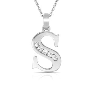 May include: A silver pendant necklace with a letter 'S' charm. The charm is set with small clear diamonds.