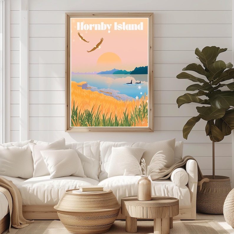 May include: A retro-style travel poster with the text "Hornby Island" in white letters on a pink background. The poster features a scenic landscape with a body of water, mountains, birds, and orcas.