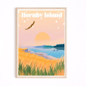 May include: A retro-style travel poster featuring a scenic view of Hornby Island, British Columbia. The poster features a sunset over a body of water with a mountain range in the background. A bald eagle flies overhead, and two orcas swim in the water. The poster is framed in a light wood frame.