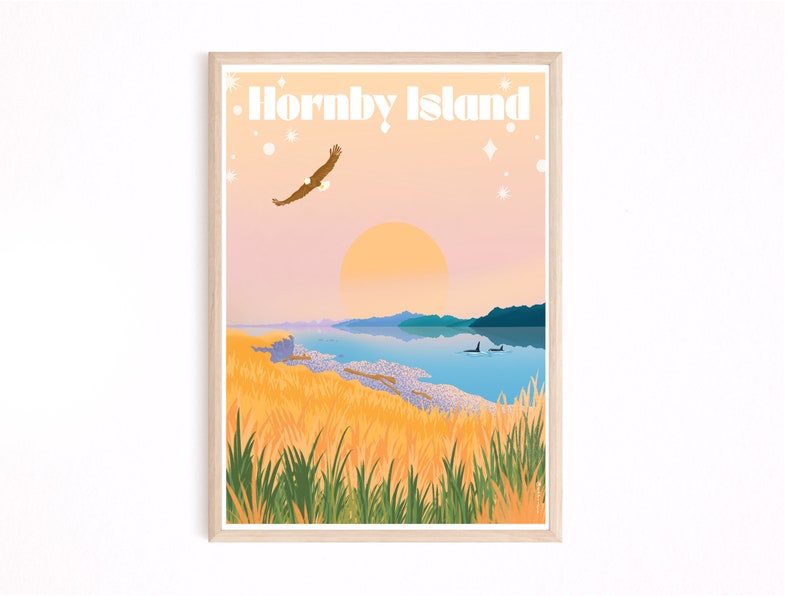 May include: A retro-style travel poster featuring a scenic view of Hornby Island, British Columbia. The poster features a sunset over a body of water with a mountain range in the background. A bald eagle flies overhead, and two orcas swim in the water. The poster is framed in a light wood frame.
