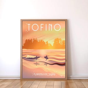 May include: A retro-style poster with a sunset scene of surfers in the ocean. The poster features the text "TOFINO" in white letters and "VANCOUVER ISLAND" in smaller white letters at the bottom. The poster has a warm orange and yellow color scheme.