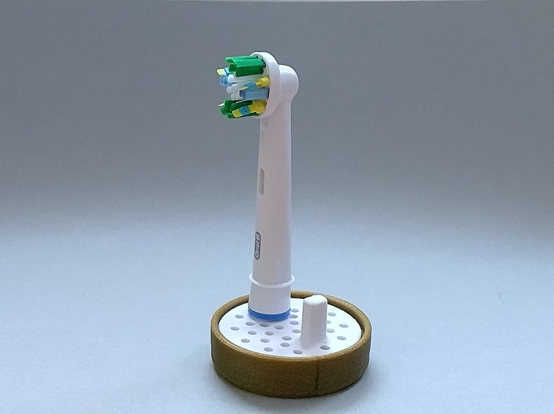 Oral-B toothbrush stand with drip tray, head holder attachment, round design version for the bathroom. Hygienic accessories image 7