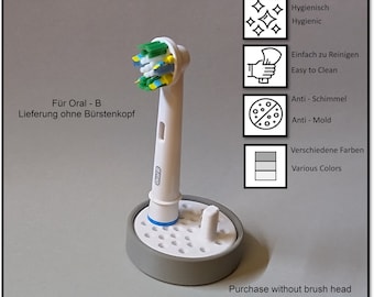 Oral-B toothbrush stand with drip tray, head holder attachment, round design version for the bathroom. Hygienic accessories