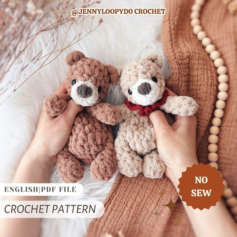May include: Two handmade crochet teddy bears in shades of brown and beige. One bear has a red collar. The bears have white muzzles and black eyes. The image includes the text "@JENNYLOOPYDO CROCHET", "ENGLISH|PDF FILE", "CROCHET PATTERN", and "NO SEW".