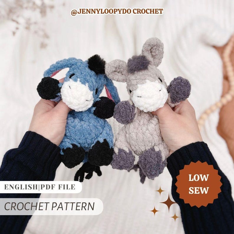 May include: Two plush donkey toys made of soft yarn, one in blue and one in gray, both featuring white muzzles and black hooves. The image includes text reading @JENNYLOOPYDO CROCHET, ENGLISH|PDF FILE, CROCHET PATTERN, and LOW SEW.