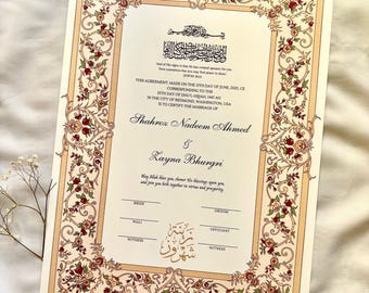 May include: A cream-colored marriage certificate with ornate floral borders in red and gold. The document includes Arabic script and English text, with spaces for signatures and the names of the bride and groom.