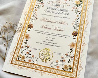 Puede incluir: Certificado de boda marfil con detalles dorados y ilustraciones florales. El certificado incluye los nombres Mohamed Akhtar y Fatima Farhat, junto con escritura árabe y texto en inglés. La fecha es el 31 de mayo de 2025.