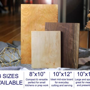 May include: Three wooden cutting boards in varying sizes. The boards are rectangular, with natural wood grain patterns. Sizes include 8"x10", 10"x12", and 10"x18". The text "3 SIZES AVAILABLE" is at the bottom.