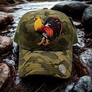 May include: A white ceramic mug with a black handle and the text "But First, Coffee" in a bold, black font. The mug is set against a blurred background, suggesting a cosy setting.