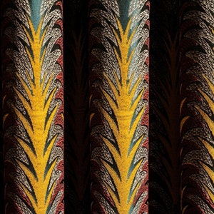 May include: Close-up of three fabric panels with a repeating pattern of yellow, red, and black stylized leaves. The fabric has a textured, woven look.