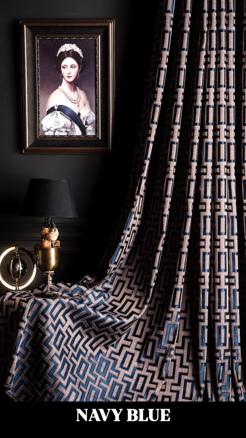 May include: Navy blue curtains with a geometric pattern of squares and rectangles. The curtains are made of a soft, luxurious fabric and have a subtle sheen.