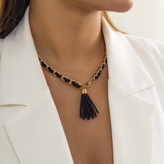 Black and gold tassel necklace deals