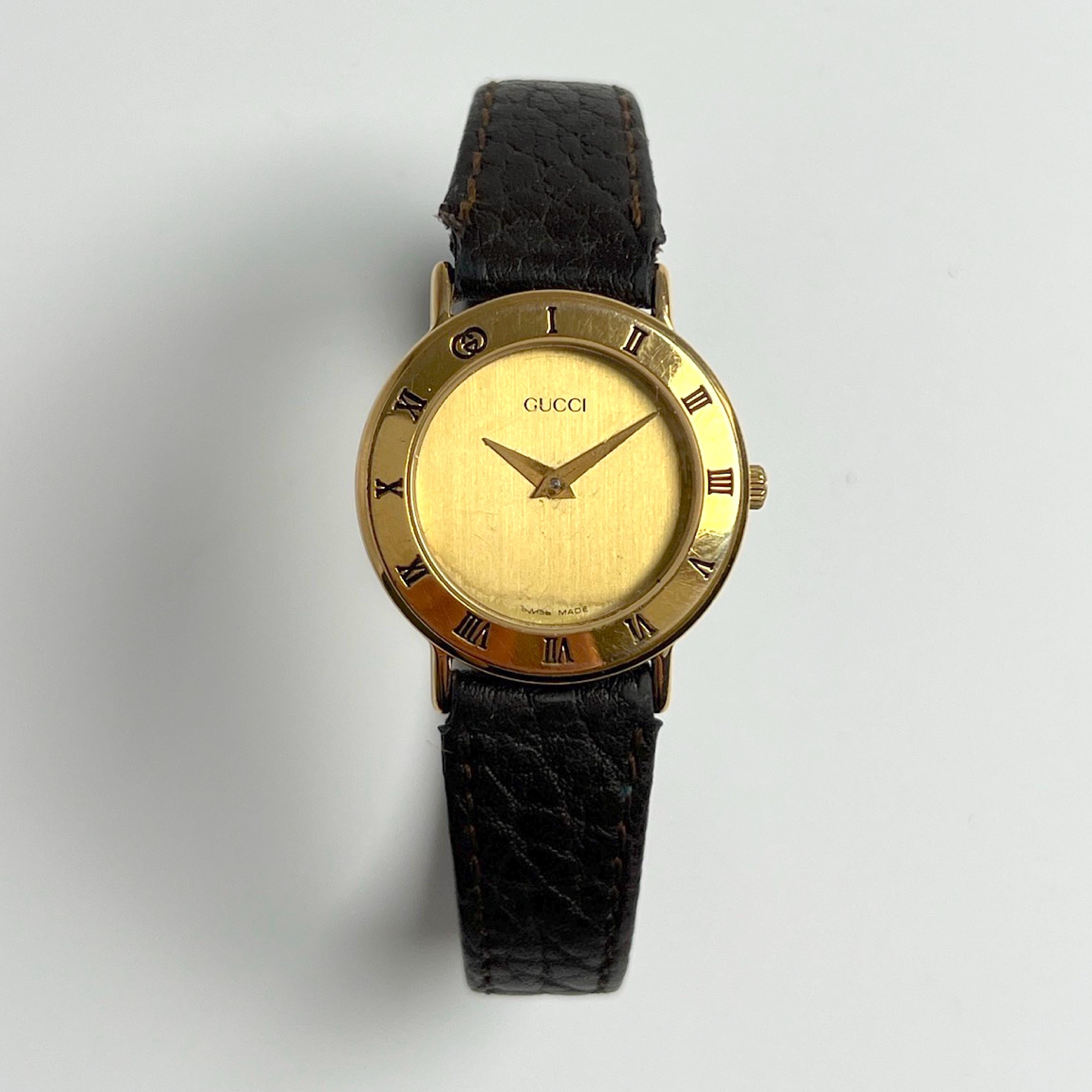 Gucci Vintage 3000L Gold Brown Leather Roman Numerals Watch Vintage Gucci in warm gold, with Roman numerals and a rich  main image 3