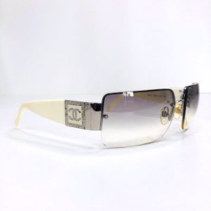 Chanel Sunglasses Rimless Monogram Crystal Silver Tinted White 