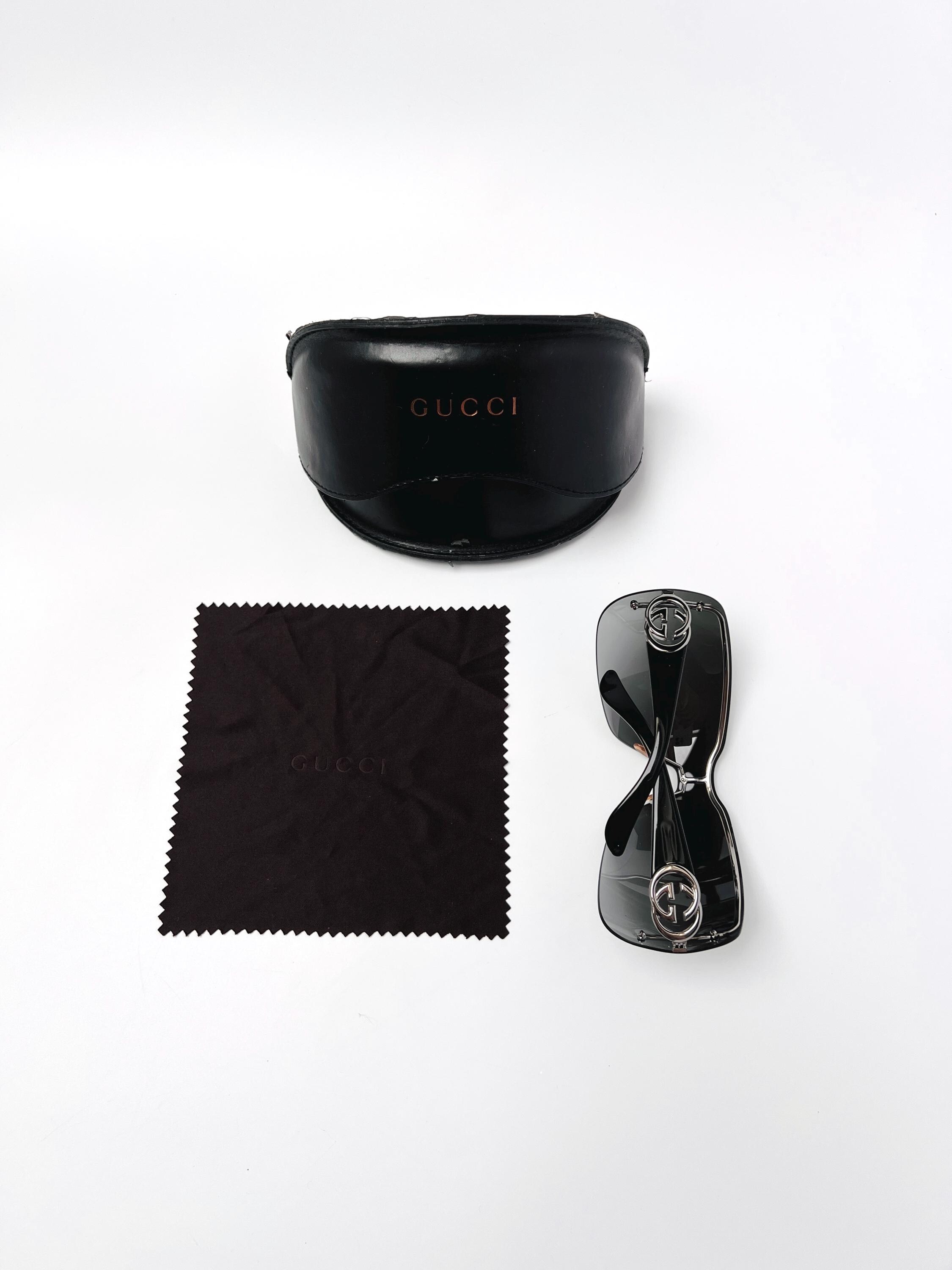 Gucci Sunglasses Rimless Shield Oversized GG Logo Wrap Black Gucci Sunglasses Rimless Shield Oversized GG Logo Wrap Black