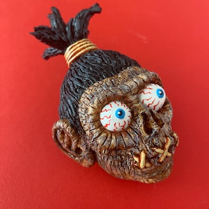 Timmy Terrible Toy cartoon gekrompen hoofd