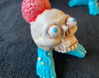 "Unbedarft ""Braindead Junior"" Spielzeug."
