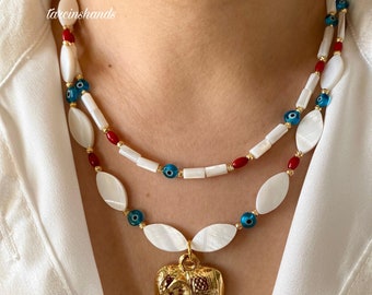 Mother of Pearl Multistrand Necklace: Red Coral, Evil Eye, Gold Elephant Pendant