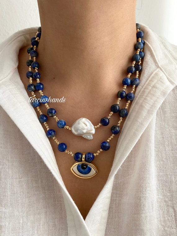 Lapis Lazuli Multistrand Necklace: Baroque Pearl, Ceramic Evil Eye Pendant