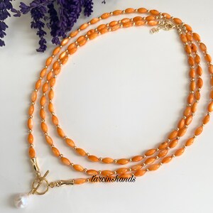 MAGNETIC PEARL SCARF NECKLACE - ORANGE main image 0