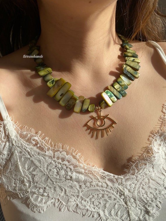 Chunky Mother of Pearl Necklace: Gold-Plated Eye Pendant