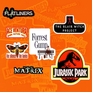May include: A collection of colorful stickers featuring movie titles and graphics. Titles include "Flatliners," "Ace Ventura," "The Silence of the Lambs," "Forrest Gump," "The Blair Witch Project," "Matrix," and "Jurassic Park."