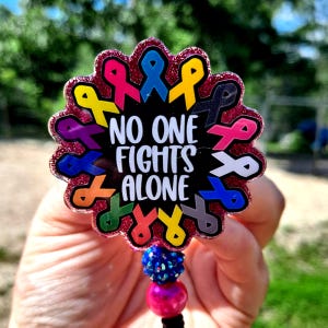 No One Fights Alone Cancer Awareness Badge Reel