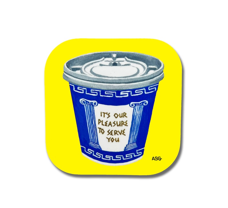May include: A blue and white coffee cup with a gold inscription that reads "It's our pleasure to serve you". The cup is on a yellow background.