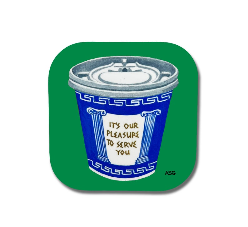 May include: A blue and white coffee cup with a gold Greek key design and the text "It's our pleasure to serve you". The cup is sitting on a green background.