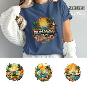 May include: A navy blue t-shirt featuring a colorful graphic of Runaway Bay, Jamaica, with a sun, palm trees, and seashells. The text "RUNAWAY BAY JAMAICA" is prominently displayed. Additional graphics of Negril, Ocho Rios, and Montego Bay are shown.