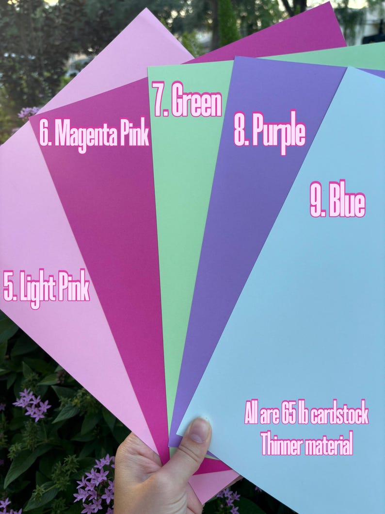 May include: Five different colored cardstock paper samples in light pink, magenta pink, green, purple, and blue. All are 65 lb cardstock, thinner material.