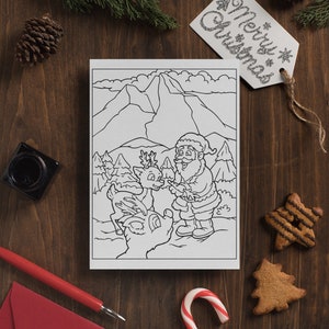May include: A black and white coloring page featuring Santa Claus giving a carrot to a reindeer. The scene is set in a snowy mountain landscape.