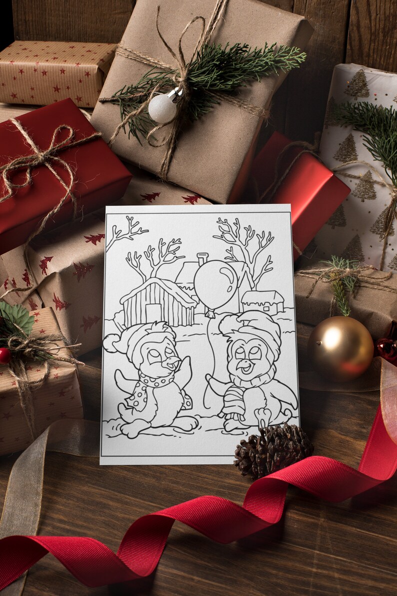 May include: A black and white coloring page featuring two penguins holding a balloon. The penguins are wearing hats and scarves. The scene is set in a snowy winter landscape with a small house and trees.