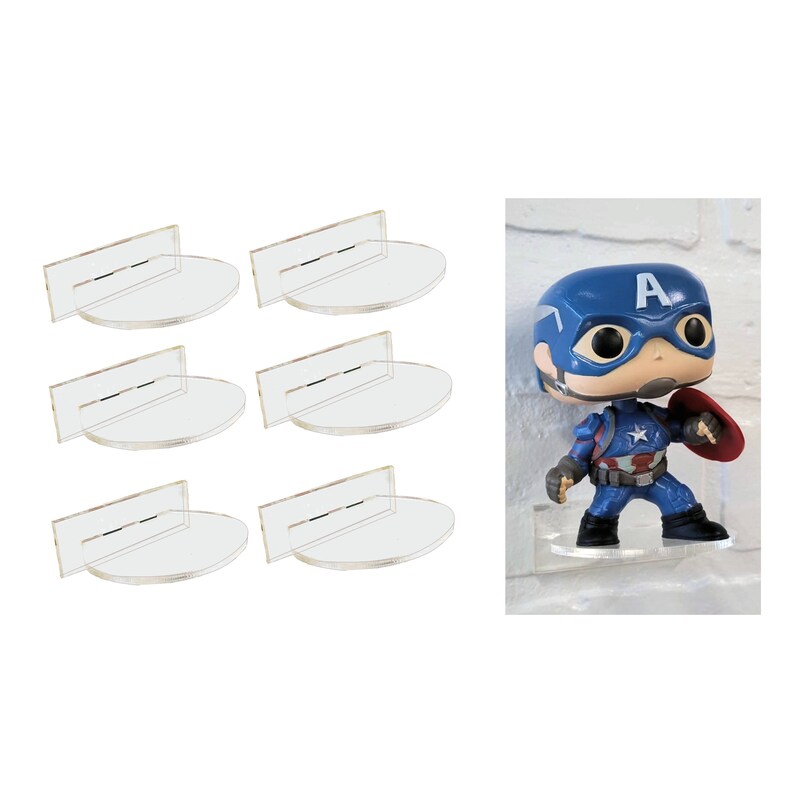 May include: Six clear acrylic wall shelves for displaying figurines. The shelves are round and have a lip to prevent items from falling off. A Captain America Funko Pop figurine is displayed on one of the shelves.