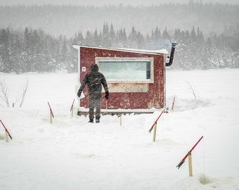Ice fishing during a snow storm
