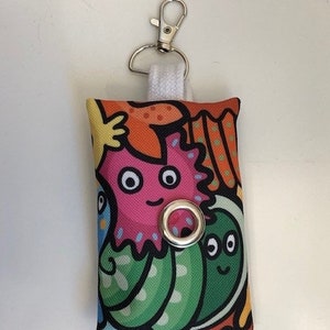 Pupsie the dog waste bag dispenser, the dog waste bag bag, monster image 1