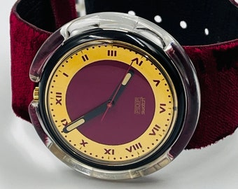 rarissimo orologio pop swatch originale degli anni '90, iconico orologio in stile anni '90, realizzato in velluto rosso, realizzato in Svizzera, funziona perfettamente