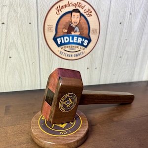 May include: A wooden gavel with a Masonic symbol on the head and a wooden base with the text "NO. 1".