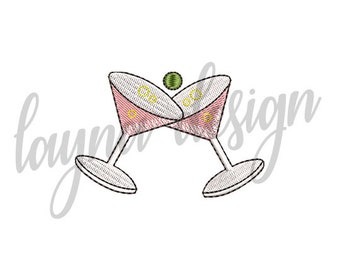 May include: Two pink martini glasses clinking together with a green olive on a stem in the center.