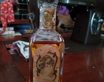 Vintage California Avon perfume bottle with perfume