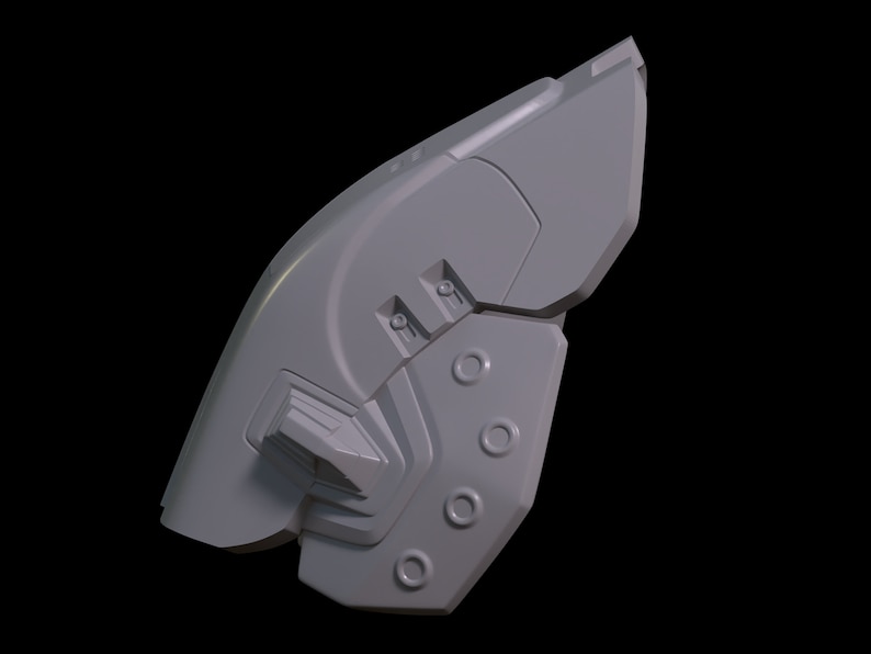 May include: A gray, 3D-printed model of a futuristic, spaceship-like object with a rounded, curved shape and a series of small, circular openings.