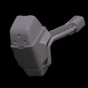 May include: A gray, futuristic-looking, 3D-printed model of a robotic arm with a rounded, boxy base and a long, articulated arm.