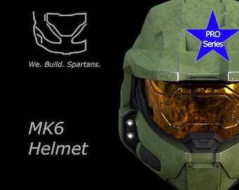 Könnte beinhalten: Olivgrüner MK6-Helm mit goldenem Visier, gekennzeichnet mit "PRO Series" auf einem blauen Stern. Das Bild enthält den Text "We. Build. Spartans." und "MK6 Helmet" auf schwarzem Hintergrund.