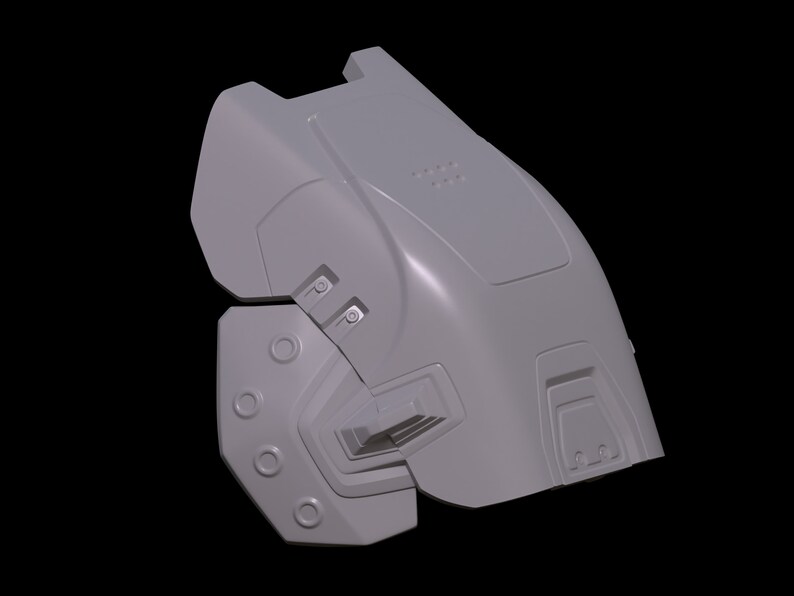 May include: A gray 3D model of a futuristic helmet with a textured surface and multiple details. The helmet is designed with a segmented structure, featuring a large, rounded top section and a smaller, more angular lower section. The helmet has a series of circular openings and raised ridges, giving it a mechanical and intricate appearance.