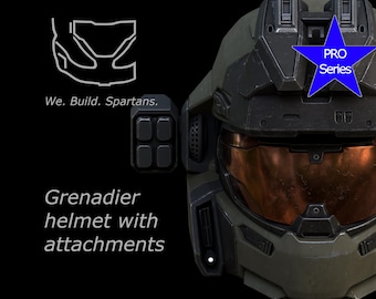 Puede incluir: Primer plano de un casco Grenadier con accesorios, en verde oscuro y negro. El casco tiene una visera color cobre y un emblema azul en forma de estrella que dice "PRO Series". También se ve el texto "We. Build. Spartans."