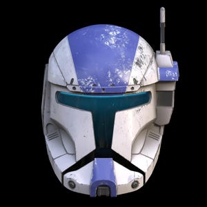May include: A white and blue helmet with a visor and antenna, reminiscent of a clone trooper. The helmet has a weathered appearance with blue accents on the top and front, and a dark blue visor. The design suggests a science fiction or cosplay theme.