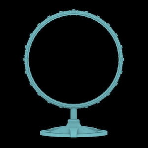 Peut inclure: Un support de bague en métal bleu clair avec une base circulaire. La bague est décorée d'une série de petites bosses saillantes, régulièrement espacées.